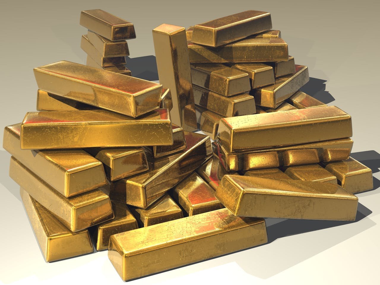 De invloed van de dollar op de goudprijs en jouw investering